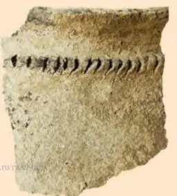 The crown of a stucco pot of the Bronze Age