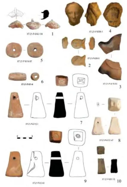 A collection of fragments of terracotta and spinning-wheel lamps and weaver's sinkers