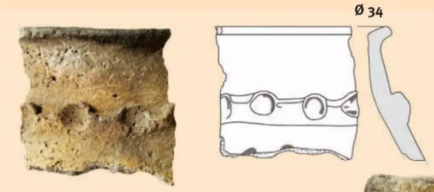 The crown of a stucco pot of the Bronze Age