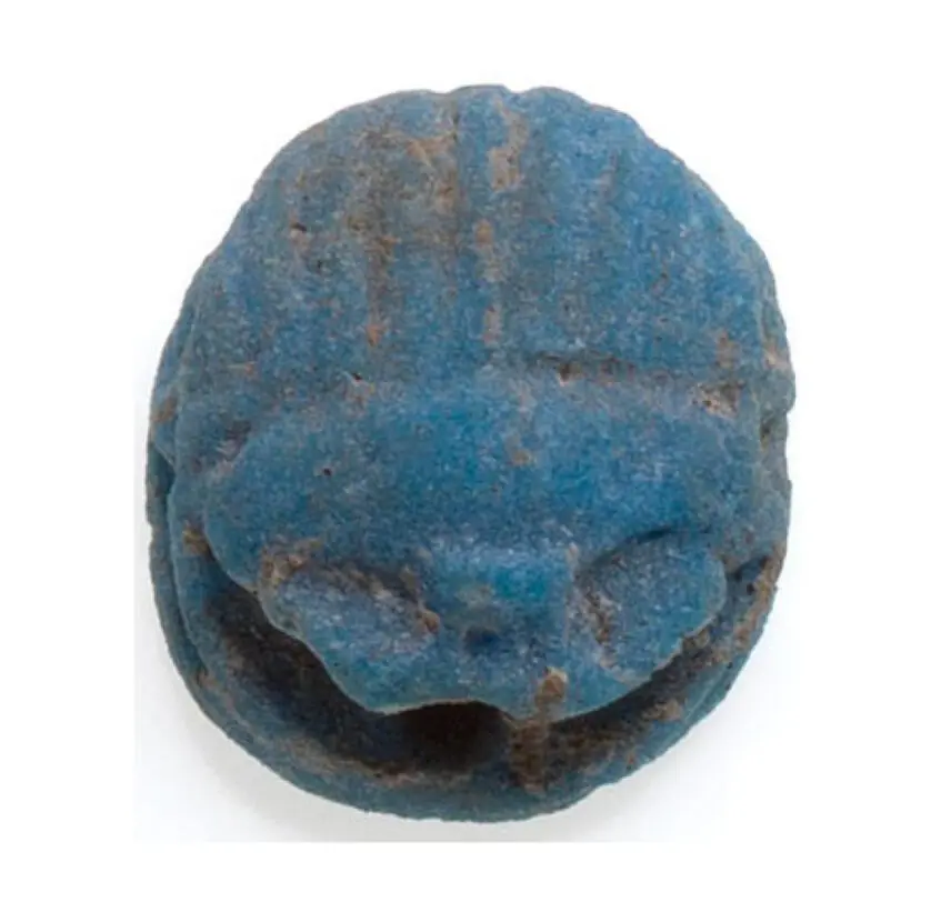 Egyptian faience pendants in the form of scarabs