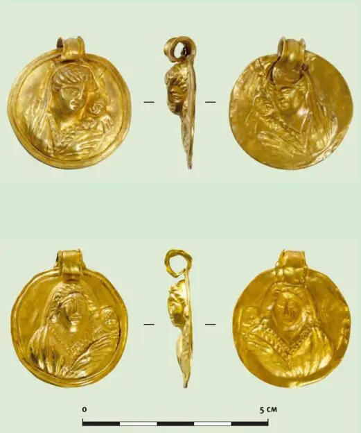 Medallions with the image of a woman and a baby