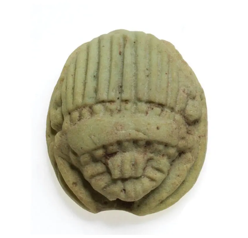 Egyptian faience pendants in the form of scarabs