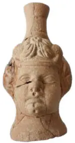 Figurative vessel in the shape of a woman's head