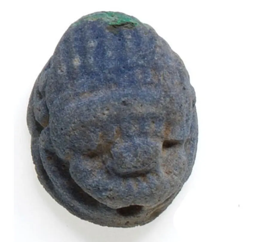 Egyptian faience pendants in the form of scarabs